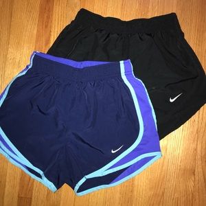 Two pairs of Nike XS Tempo Shorts